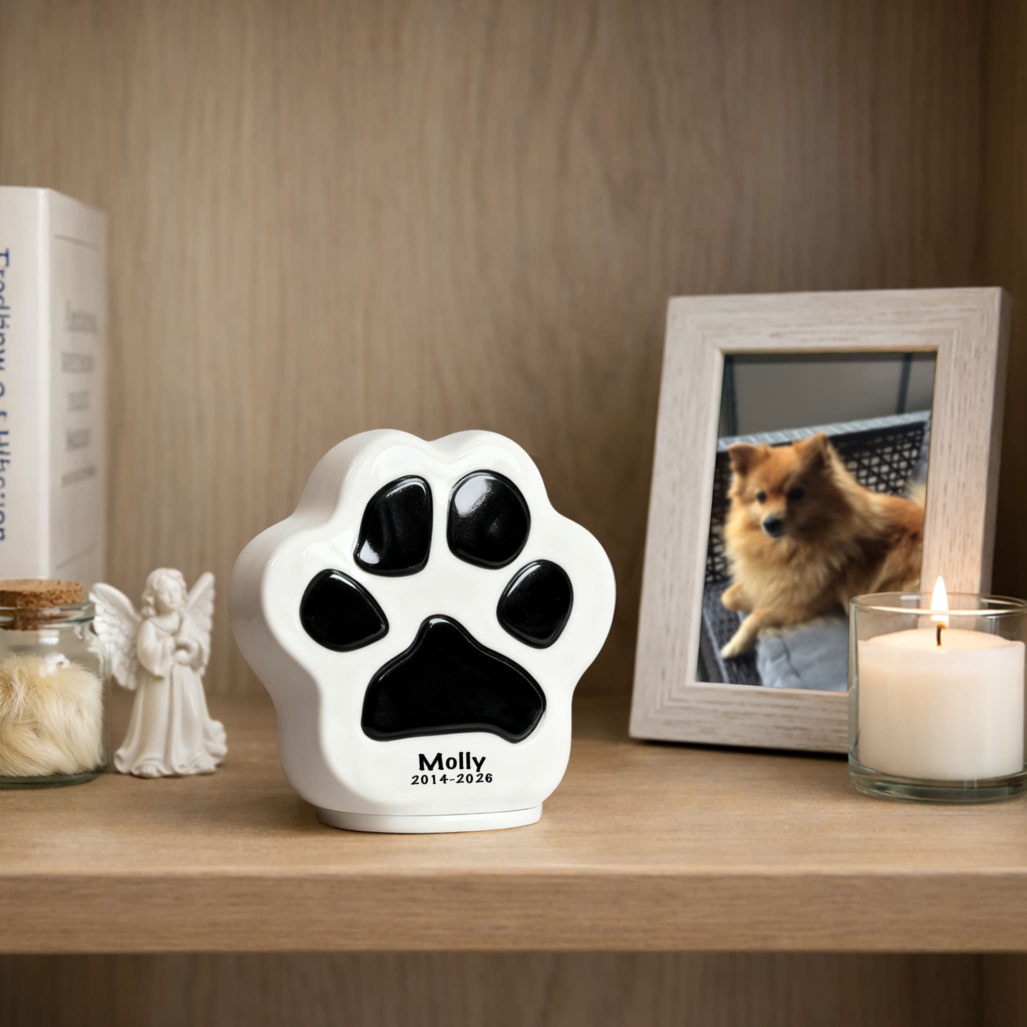 Paw Print Pet Urn – Memorial Display for Pomeranian Molly on Shelf with Angel Figurine and Lit Candle